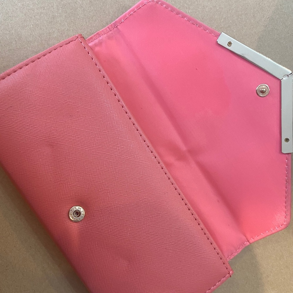 Pink wallet with credit cards slots